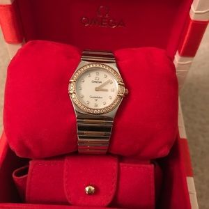 Omega constellation ladies watch with diamonds.